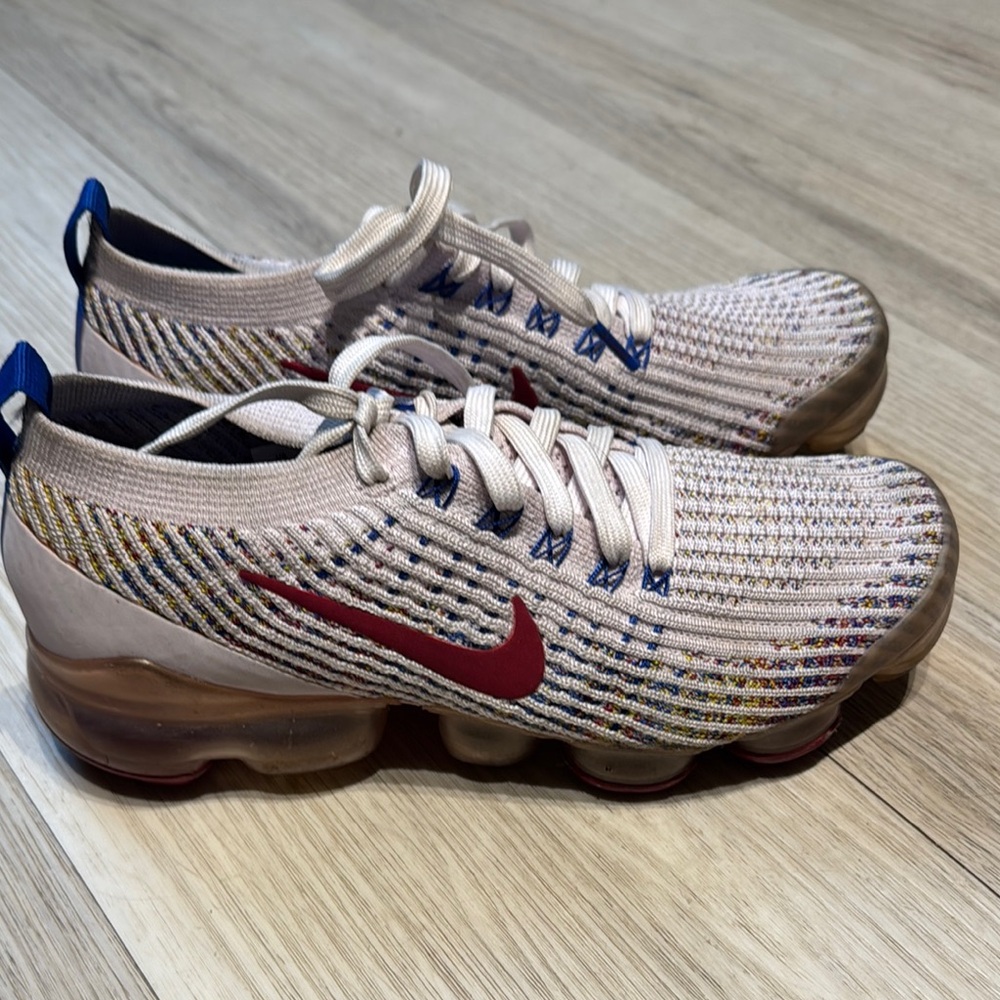 Nike Red Athletic Shoes with Knit Upper and Air Cushioning